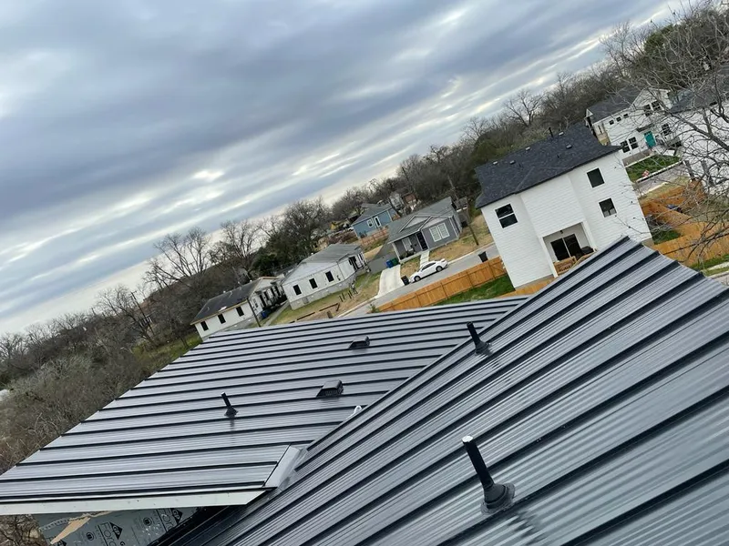 Standing seam metal roof panels with vents for Skylight Repair in Hickory